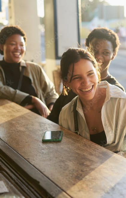a group of people sitting at a table