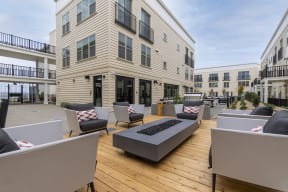 outdoor, long rectangular fire pit with seating around