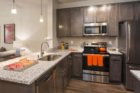 Kitchens with Upgraded Finishes at The Gentry at Hurstbourne, Louisville, 40222