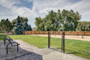 Bark park area with gate at pet friendly apartments in fort collins