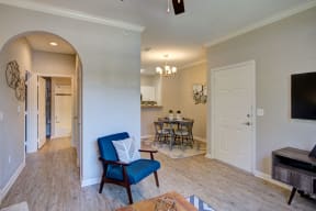 Living room/dining area with arch way interior wall in fort collins