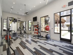 Fitness center with cardio equipment and weights