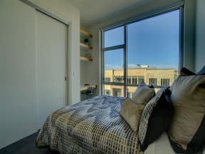 Bedroom With Expansive Windows at The Residences on High Street, Phoenix