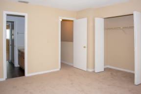 Bedroom with closet and en suite bathroom at Laurel Grove Apartment Homes, Orange Park