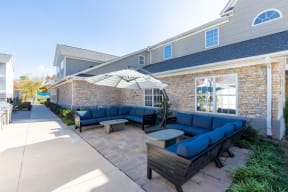 Indigo Apartments Clubhouse Patio with Seating