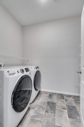 Walk-In Closet With Full-Sized Washer & Dryer