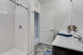 Bathroom With Walk-In Shower With Tile Flooring