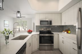 Grey Kitchen at Haven at Arrowhead Apartments in Glendale Arizona