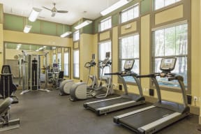 The Grove at Waterford Crossing Apartments Fitness Center with Elliptical, Free Weights, Treadmill, and More