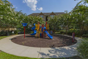 The Grove at Waterford Crossing Apartments in Hendersonville - Bedroom with Playground