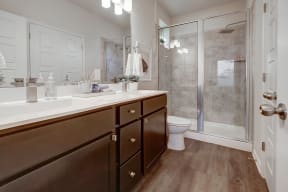 Standing showers and double bathroom vanities