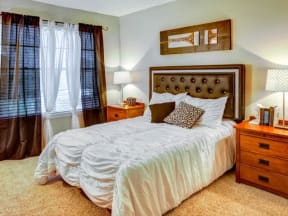 Bedroom with plush carpeting