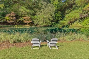 2 chairs at lake