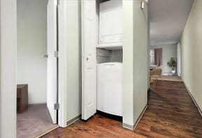 Stacked Washer and Dryer in hall closet.