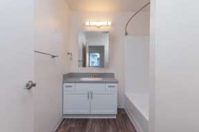 Fernwood | 1x1 Bathroom with white cabinetry