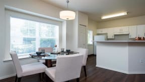 Village at Main Street | Spacious Kitchen with Adjacent Dining Room with Plank Style Flooring