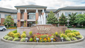 Village at Main Street | Monument Sign and Building Exterior