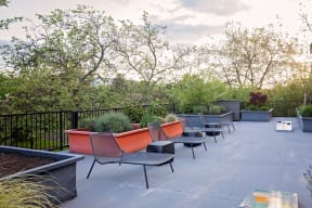 Quad-Corvallis-Rooftop-Lounge-chairs-and-cornhole-game