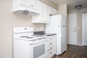The Crossings| Kitchen with White Cabinets