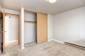 a bedroom with a large closet