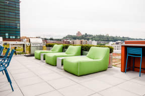 Apartments in Seattle, WA - Icon Apartments Rooftop Deck with BBQs and City Views