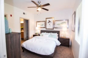 Two Bedroom Apartments in West Valley Phoenix AZ - West Town Court Apartments - Bedroom with Carpet Flooring and Window for Ample Natural Lights