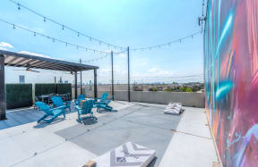 Rooftop Deck with Mural and Seating Area at Hiline Heights in Houston, Texas