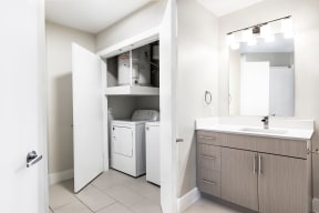Bathroom with washer dryer closet