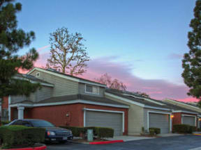 Ontario CA Apartments for Rent - Exterior View of Rancho Vista's Building Showing Expansive Community and Garages