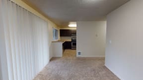 Apartments for Rent in Ontario - Encore Apartment Homes - Living Room Unfurnished, Wall to Wall Carpet with Access to Patio and Kitchen
