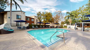 Apartments in Ontario CA - Exterior View of Avante Apartments Building with View of Outdoor Pool