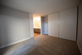 Apartments Near Victoria Gardens - Aspire Upland - Unfurnished Bedroom With Carpet Flooring, Spacious Closet, and Attached Bathroom