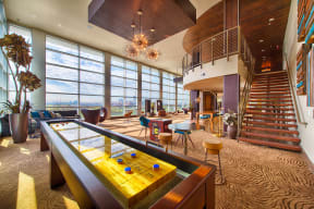 Game Room With Shuffle Board at Revl Heights, The Barvin Group, Houston, TX, 77009