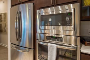 Electric Range In Kitchen at Revl Heights Apartments, The Barvin Group, Texas