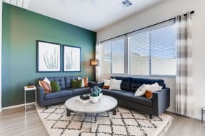 Living Room With Expansive Window at Avilla Centerra Crossings, Goodyear