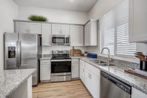 Kitchen with appliances at Avilla Enclave, Arizona, 85212