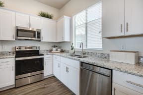 Spacious Kitchen With Pantry Cabinet at Avilla Lago, Peoria