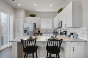 Gourmet Kitchen With Island at Avilla Parkway, Texas, 75009