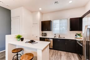 Fitted Kitchen With Island Dining at Avilla Lehi Crossing, Arizona, 85213