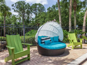 Granite at Porpoise Bay Apartments Daytona Beach pool deck seats