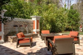 Zen Garden and Fireside Seating at The Amalfi Clearwater Luxury Apartments in Clearwater, FL
