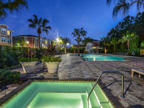 Resort-Style Pool Deck and Spa at The Amalfi Clearwater Luxury Apartments in Clearwater, FL