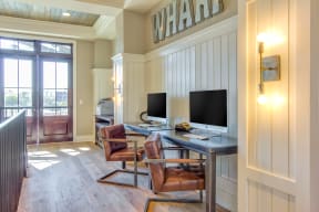 business center in clubhouse with apple computers