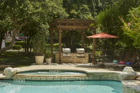 Poolside patio with grills| Museo