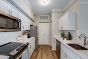 Kitchen with white cabinetry | Ashlar Fort Myers