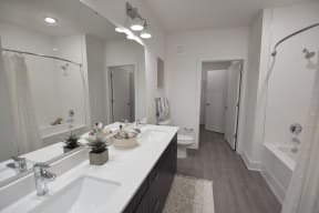 Bathroom with double sink| The Maven at Suwanee