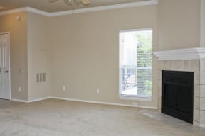 Living room with fireplace | Madison at the Arboretum