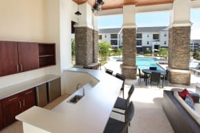 Outdoor kitchen and lounge area | Village at Terra Bella