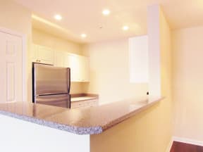 Kitchen with granite countertops  | Highlands at Faxon Woods
