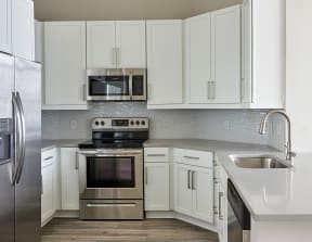 Kitchen with stainless steel appliances | Inspire Southpark